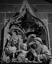 Canon Conrad de Bussnang praying to Virgin and Child. (15th c.)