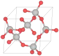 Crystal structure of α-quartz (red balls are oxygen, grey are silicon)