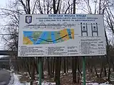 Construction information board at Trukhaniv Island in 2009