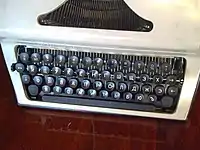 Russian typewriter, circa 1985. № sign can be seen on the .mw-parser-output .keyboard-key{border:1px solid #aaa;border-radius:0.2em;box-shadow:0.1em 0.1em 0.2em rgba(0,0,0,0.1);background-color:#f9f9f9;background-image:linear-gradient(to bottom,#eee,#f9f9f9,#eee);color:#000;padding:0.1em 0.3em;font-family:inherit;font-size:0.85em}1 key.