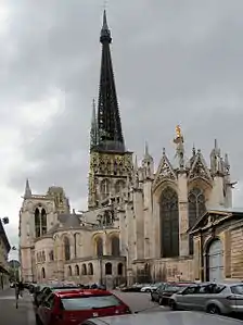 The Chevet, or east end of the cathedral, topped with a gilded statue of the Virgin Mary.