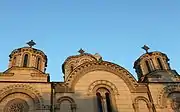 Top of the facade and detail of the domes of the Church of the Holy Trinity in Leskovac