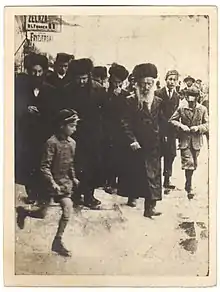 Grand Rabbi Shmuel Shlomo Leiner of Radzin (second from left - with black beard) with a group of Radziner Hasidim in pre-war Europe