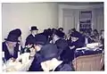 Radziner Chassidim in the US at the Tisch of their Rebbe Grand Rabbi Avraham Yissochor Englard of Radzin commemorating the Yahrtzeit of his father-in-law the Tiferes Yosef - at his shtiebel in Crown Heights, Brooklyn - 26 Shvat 5751 (1991)