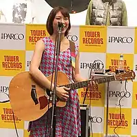 An oversized, colored houndstooth dress