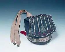 A guan, one of the traditional headwears for men.