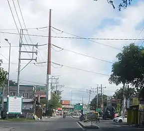Steel pole 314 (of anchor or flag design) located at NLEX–Pulilan Exit in Bulacan.