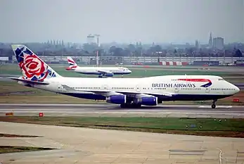 747 in "Utopia" livery and Chelsea Rose tail art (photo from 2002, livery used 1997–2006)
