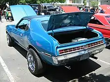 shows the rear end of a 1972 Javelin finished in blue with the tail lamp design following the "egg crate" pattern