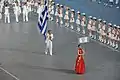 The 2008 Summer Olympics Parade of Nations signs were in French, English and Simplified Chinese.
