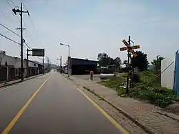 Level crossing near the former Eocheon Station.mw-parser-output .geo-default,.mw-parser-output .geo-dms,.mw-parser-output .geo-dec{display:inline}.mw-parser-output .geo-nondefault,.mw-parser-output .geo-multi-punct{display:none}.mw-parser-output .longitude,.mw-parser-output .latitude{white-space:nowrap}37°14′58″N 126°54′39″E / 37.24944°N 126.91083°E / 37.24944; 126.91083