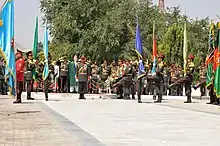 Image 19President Hamid Karzai observing the honor guard of the Afghan armed forces during the 2011 Afghan Independence Day. (from Culture of Afghanistan)