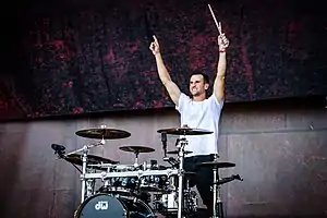 Matt Greiner performing with August Burns Red in 2017