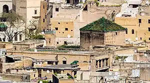 Saffarin Madrasa (dated to 1271): minaret is on the left and prayer hall (pyramidal roof) on the right