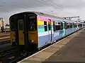 One Class 317 at Cambridge in July 2005