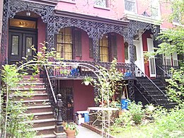 Italianate townhouses on East 18th Street (1853), with cast-iron verandas reminiscent of the French Quarter of New Orleans.