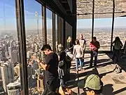 Tourists enjoy views at the southeast corner of the observation deck in 2017