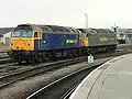 Class 47/0 No. 47&nbsp;237, in Advenza Freight livery and Class 57 No. 57&nbsp;005 in Freightliner livery at Derby railway station in 2008