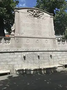 Photo of inscription which reads : "To the 54th Regiment of the Massachusetts Infantry The White officers taking life and honor in their hands cast in their lot with men of a despised race unproved in war and risked death as inciters of servile insurrection if taken prisoners besides encountering all the common perils of camp march and battle. The Black rank and file, volunteered when disaster clouded the Union cause served without pay for 18 months till given that of white troops faced threatened enslavement if captured were brave in action patient under heavy and dangerous labors and cheerful amid hardship and privations. Together, the gave to the nation and the world undying proof that Americans of African descent possess the pride courage and devotion of the patriot soldier, 180,000 such Americans enlisted under the union flag in MDCCCLXIII–MDCCCLXV. The memory of the just is blessed" then the names of members of the regiments.
