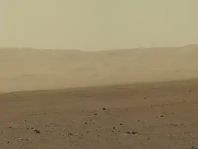 Gale Crater rim about 18&nbsp;km (11&nbsp;mi) North of the Curiosity rover (August 9, 2012).