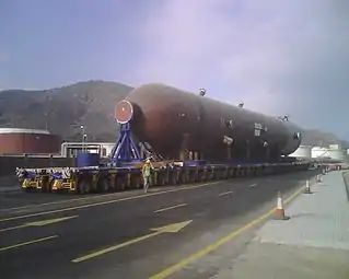 288-wheel SPMT carrying a 1,350-tonne (1,490-short-ton; 1,330-long-ton) vessel
