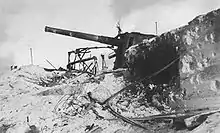 Destruction of one of the four Japanese 8-inch Vickers guns on Betio was caused by naval gunfire and air strikes. These 8-inch guns were supplied to Japan by Great Britain during the Russo-Japanese War