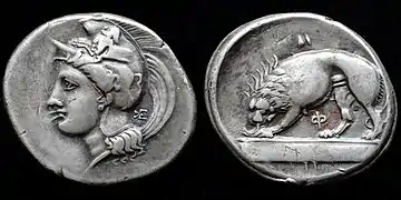 Stater struck 334-300 BC Athena wearing a Phrygian helmet decorated with a Centaur, Lion devouring prey