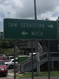 To San Sebastián or Moca, sign on PR-421, fronting PR-111, Capá