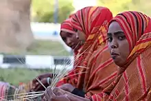 Image 10Somali women basket weaving (from Culture of Somalia)