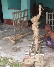 A man creating a statue in Rangpur, Bangladesh