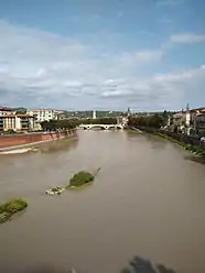 The Adige flowing through Verona, as seen from the Castelvecchio Bridge.