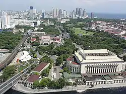 The skyline of Ermita with the Manila Central Post Office and Intramuros in the foreground