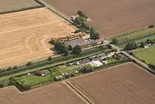 Aerial photograph of warehouse by the Louth Canal at Firebeacon Bridge.  This extraordinary brick building is over 50 metres long.