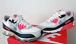 Air Max 90 360 hybrid (2006) next to the original Air Max 90 (1990) in the original "Infrared" colorway