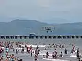 Image 10Beachgoers and an air show at Puntarenas, 2013