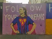 Mural in Gràcia (Barcelona) depicting Alexia Putellas as Superwoman
