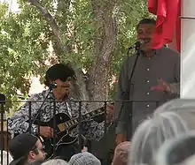 Al Hurricane Jr., at right, performing with his father in Old Town Albuquerque.