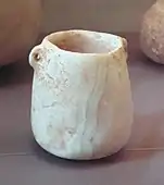 Alabaster pot with handles, Buqras region, 6500 BC Louvre Museum AO 28519