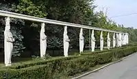 The Alley of Caryatids in the Herăstrău Park, Bucharest, Romania, dressed like Romanian peasant women