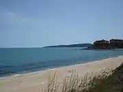 The beach across from Alepu, with the St. Thomas resort to the right