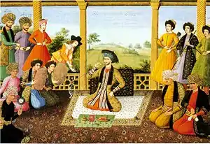 "Shah Suleiman I and his courtiers", Folio from the St. Petersburg Album. Isfahan, 1670. Two greatly distorted Georgian inscriptions are visible above the two figures at the top left. Institute of Oriental Manuscripts of the Russian Academy of Sciences