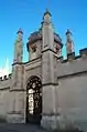 The ornamental railinged gate of All Souls College on Radcliffe Square.
