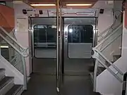 MI 2N "Altéo" interior, mid-deck showing the wide entry doors, and stairs to upper and lower decks