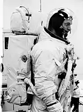 Spacesuited man with large backpack