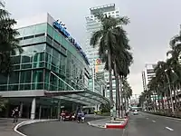 The Green Gate Facade of the Smart Araneta Coliseum, with the Gateway Mall, the Gateway Tower, the New Frontier Theater, and the Aurora Tower at the background