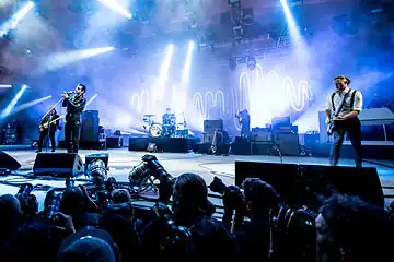 Arctic Monkeys performing at the Roskilde Festival in 2014. From left to right: Nick O'Malley, Alex Turner, Matt Helders, Jamie Cook.
