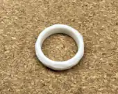 Aro ring, A white ring most commonly worn on the left middle finger.