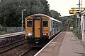 An Arriva Trains Wales Class 150 arrives with a service to Wrexham.