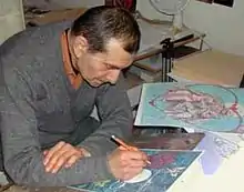 A photo of Katz in his studio.