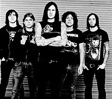 As I Lay Dying in 2006. From left to right: Phil Sgrosso, Jordan Mancino, Tim Lambesis, Nick Hipa, and Clint Norris.